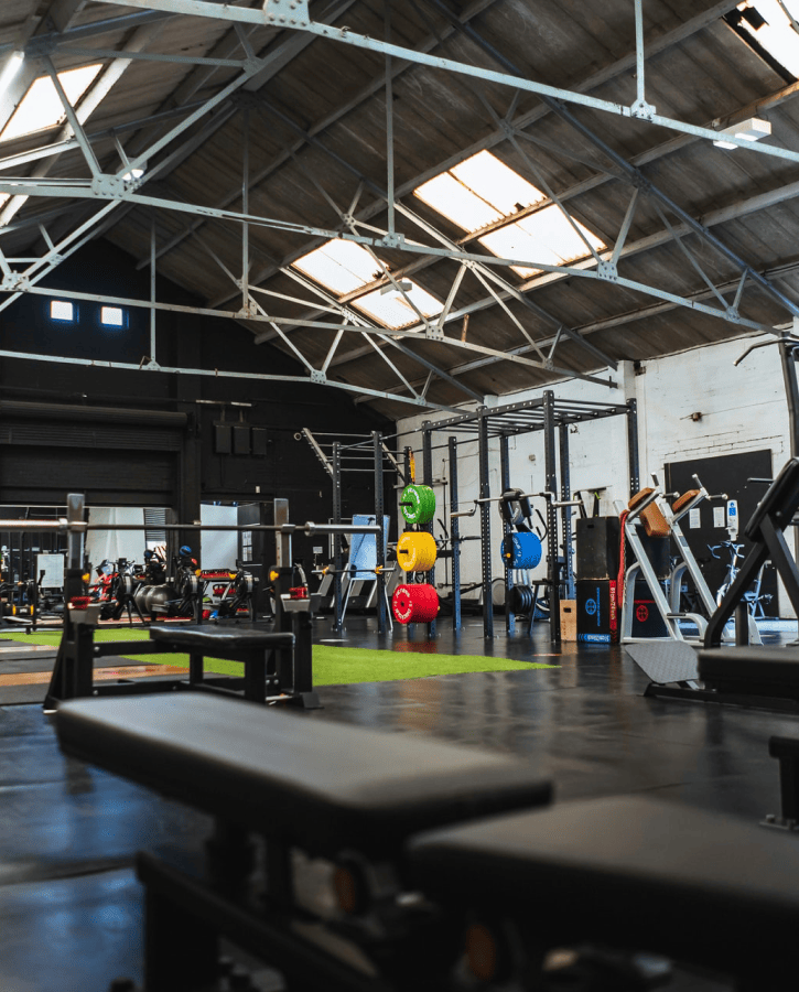 Empty gym with strength training equipment